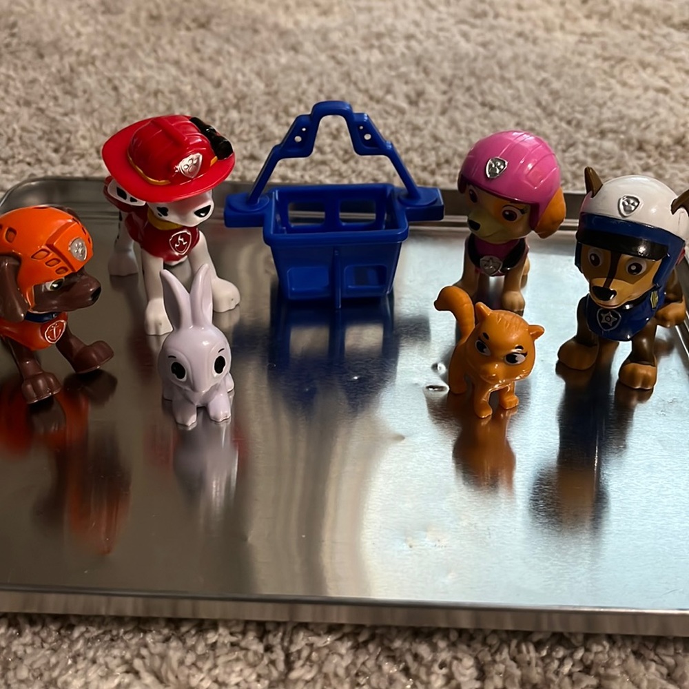7 piece Paw Patrol figurines.